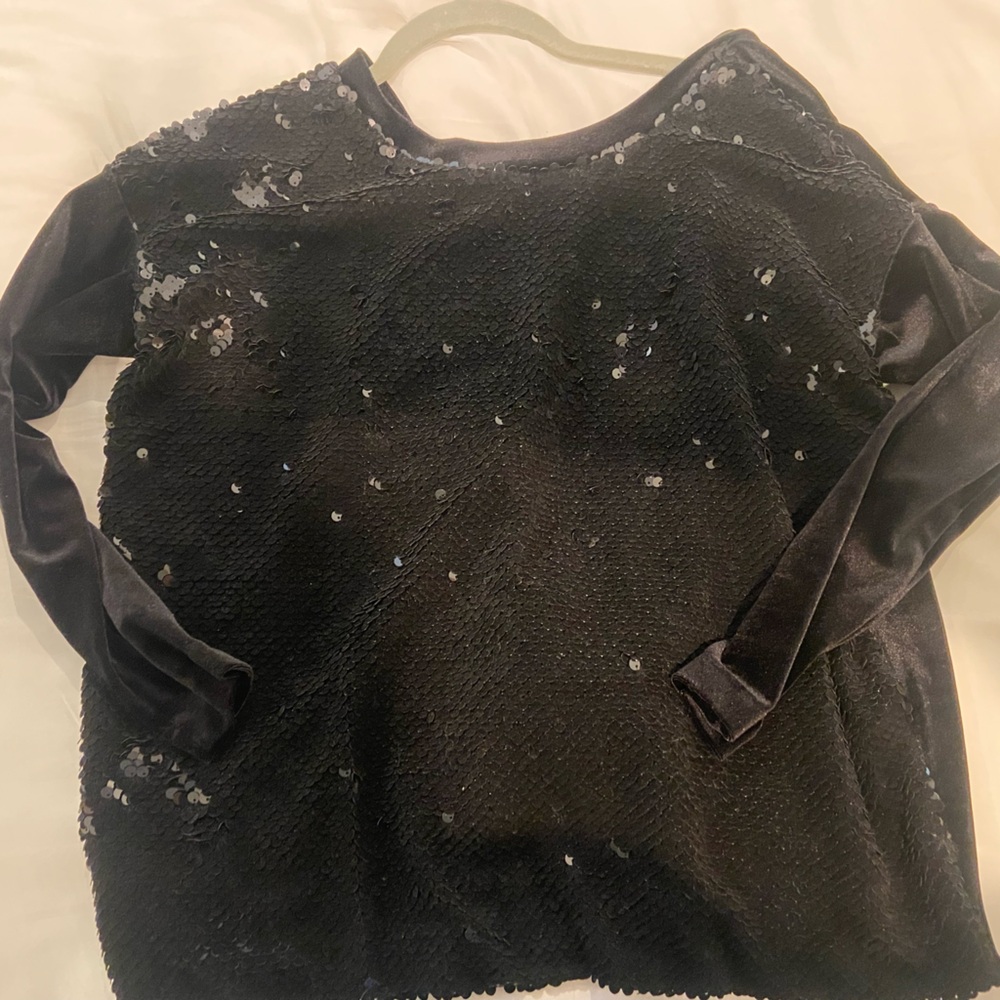 Maje black sequin velvet blouse.